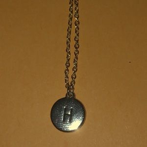 Women necklace with initial “ H “